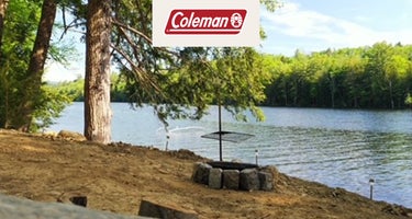 Tentrr Signature Site - Riverfront Ritz - Coleman Outfitted Site-Dual canvas tents and platforms