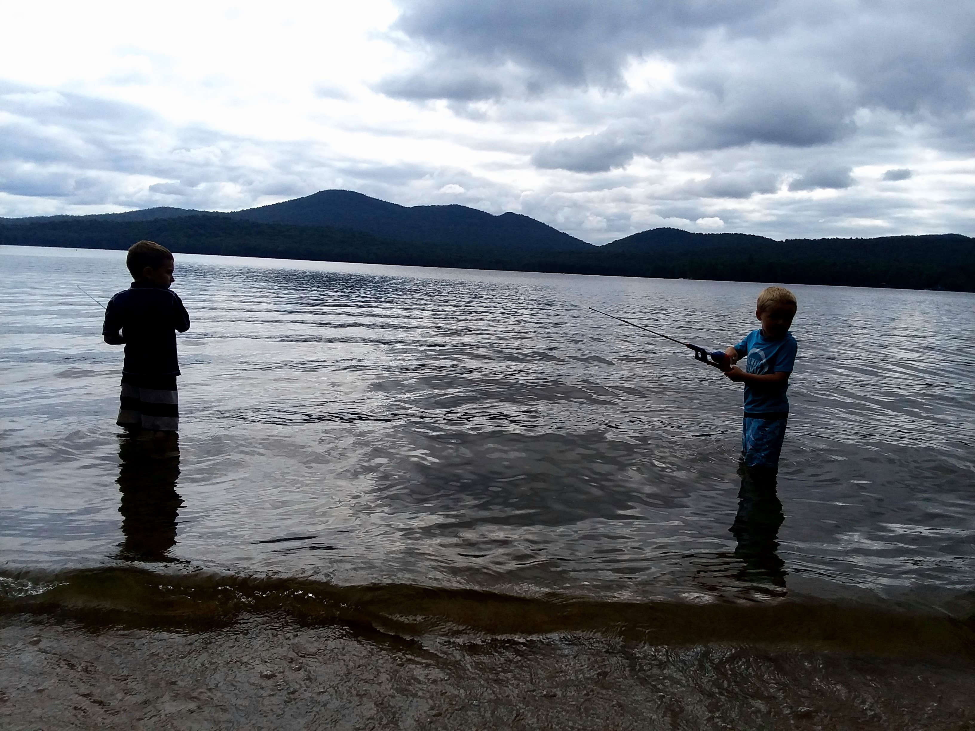 My grandsons took a little break from swimming to do some fishing. Sweet cousin time 💙💚