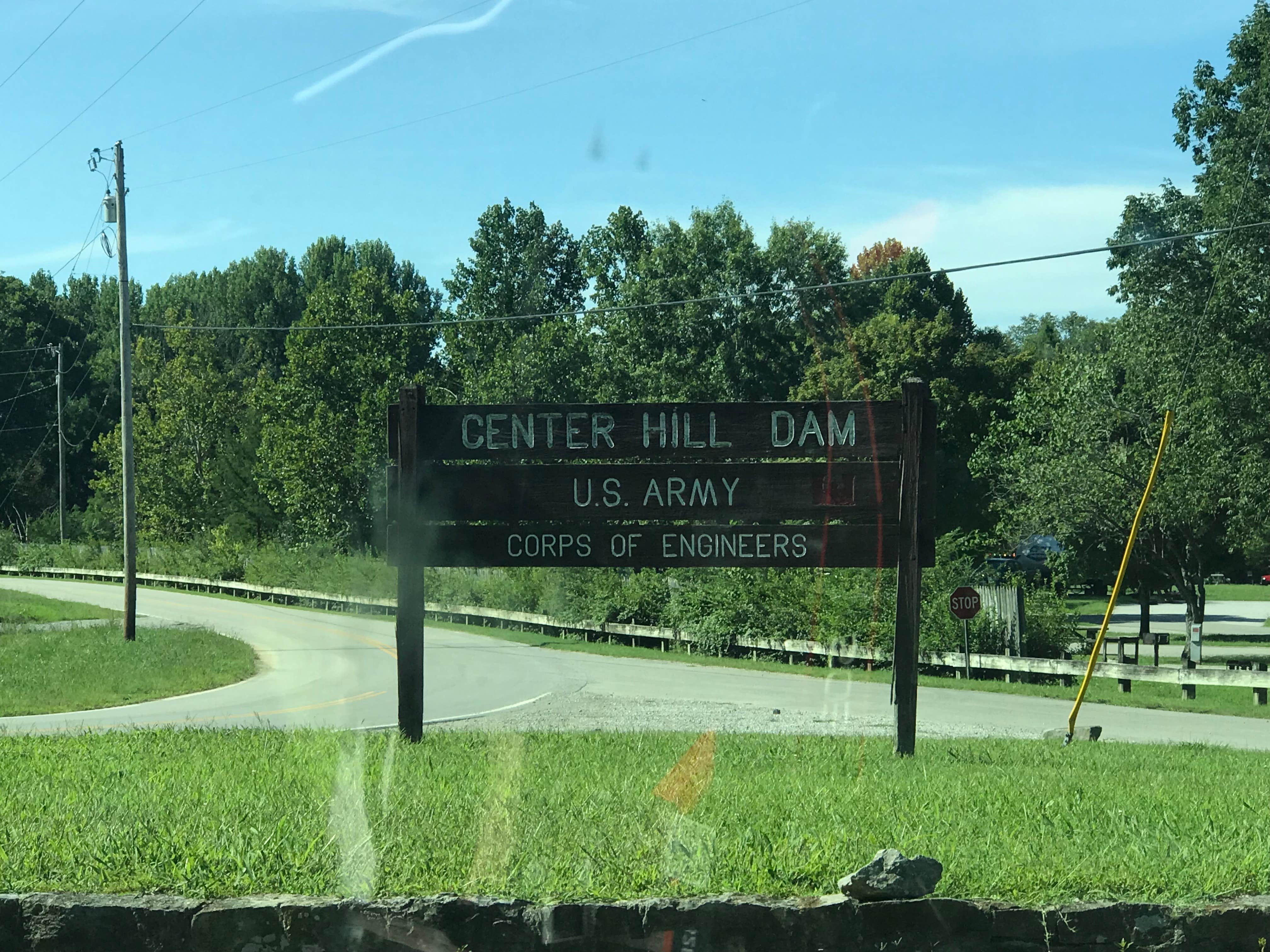 The entrance to the campground and also the dam area, this is why at first I was confused as to the ownership of the camp.   The fence you see is literally the camp and this road sets very clearly in front of it.