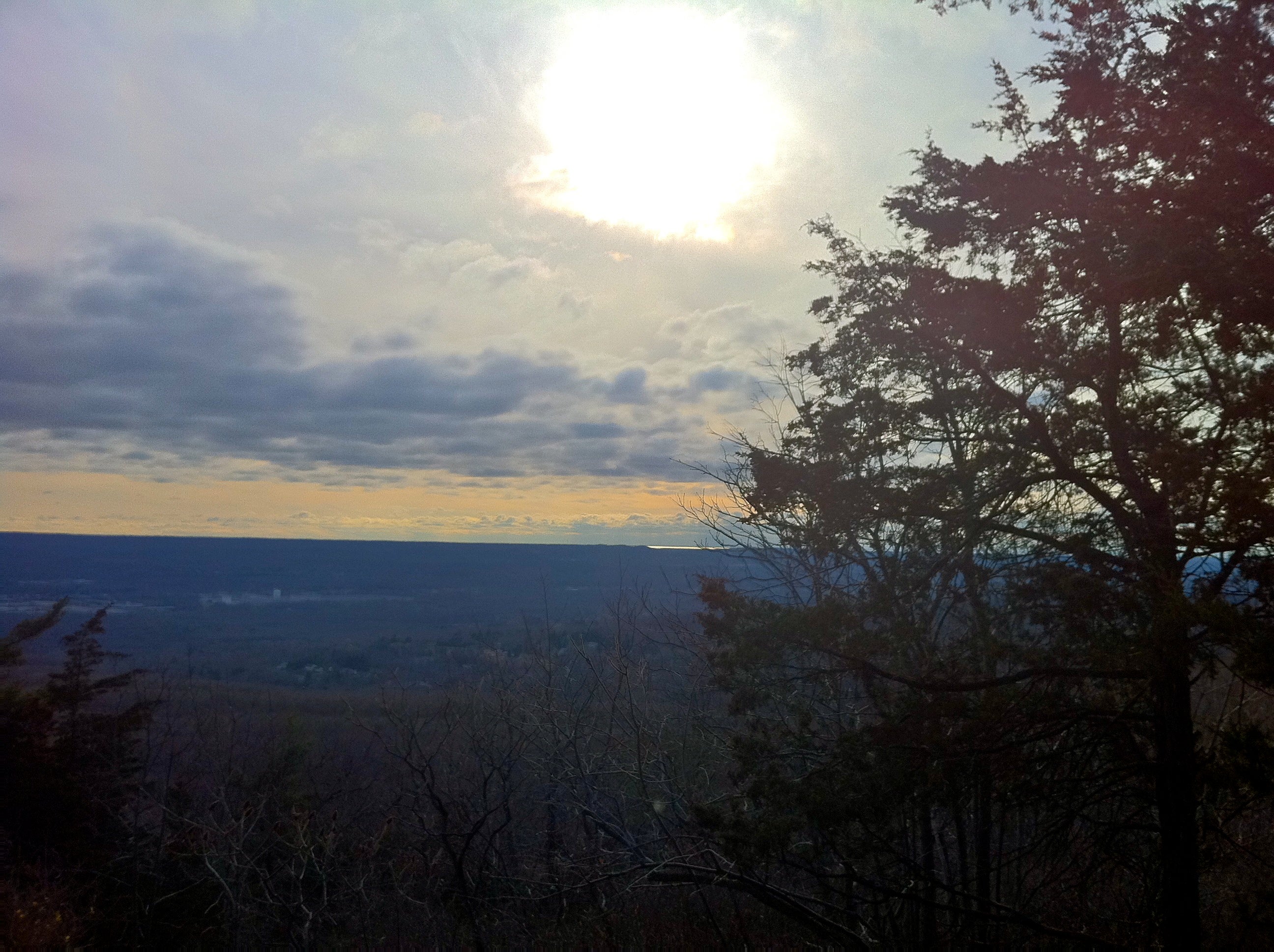Morning sunrise view from Blue (Quinnipiac) Trail on Hezekiah's Knob in Connecticut's Sleeping Giant State Park.