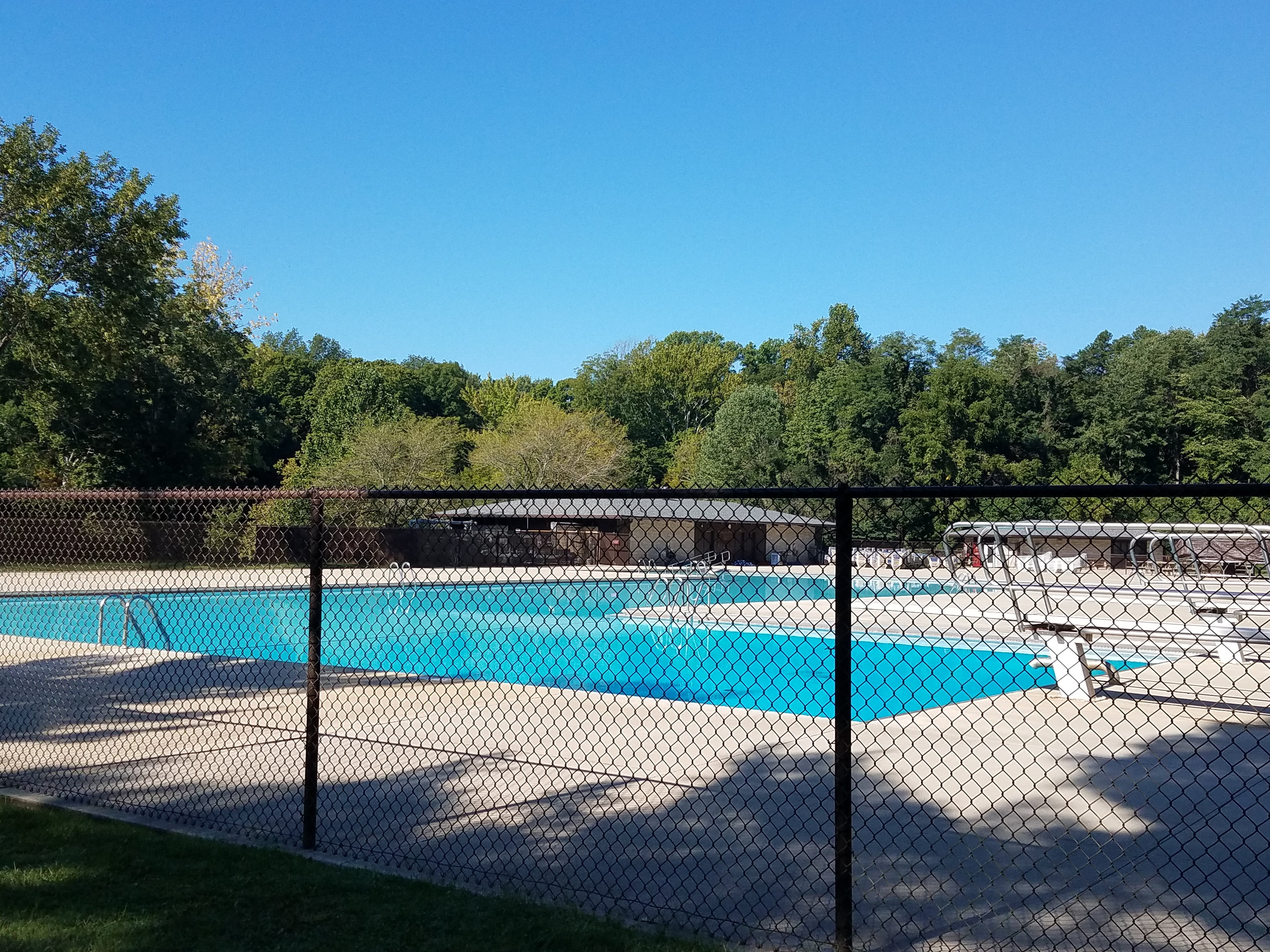 Large pool has 2 diving boards.