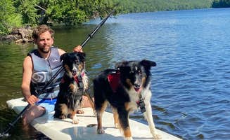 The Dyrt's photo of camping with pets at Tentrr Signature Site - Riverfront Ritz - Coleman Outfitted Site-Dual canvas tents and platforms near Saratoga Springs, NY