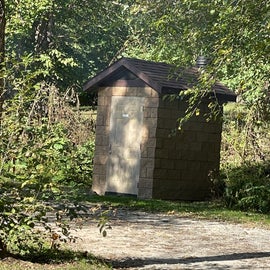The only apparent outhouse accessed through someone's site