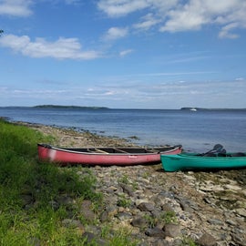 The shoreline and our boats down a path from campsite T07
