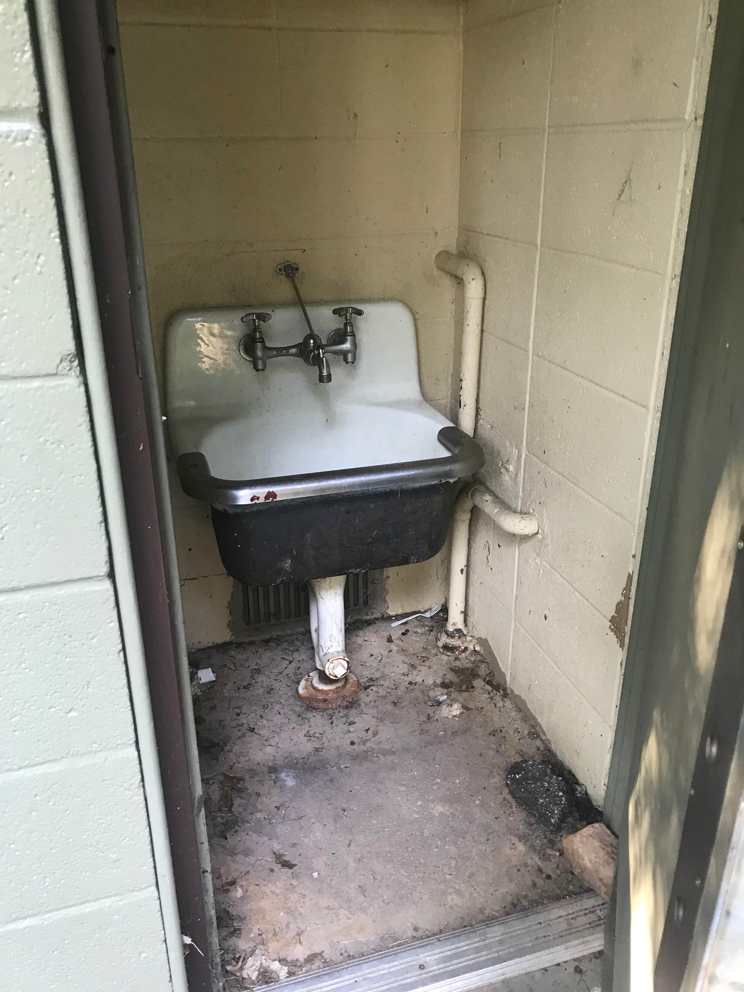 this is the cleaning area for dishes there are also fresh water spigots located throughout camp