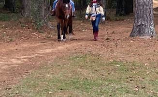 Marianne M.'s photo of camping with a horse at Pinchona Farm in Alabama
