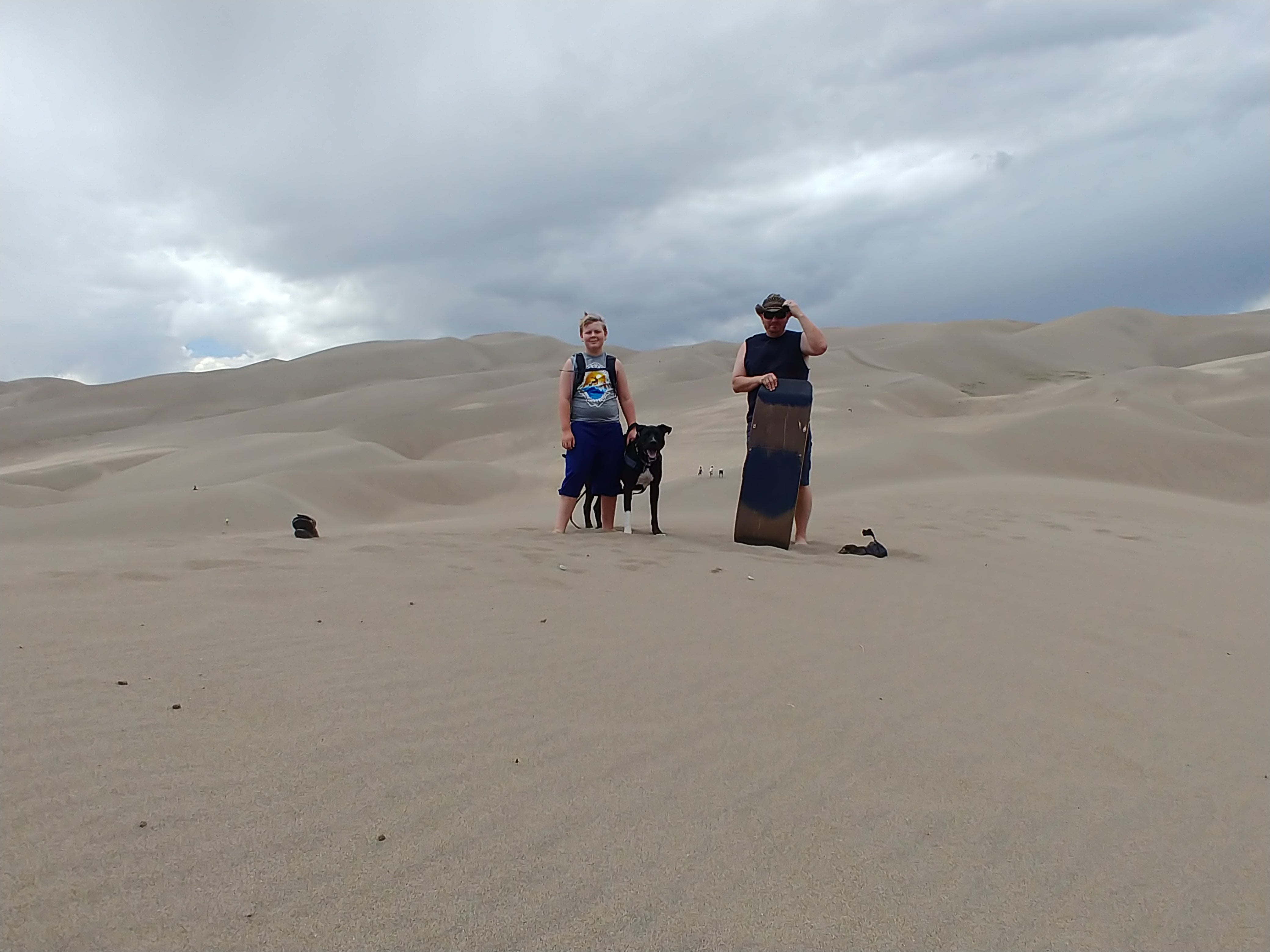 My boys with the rented sand sled at The Dunes.