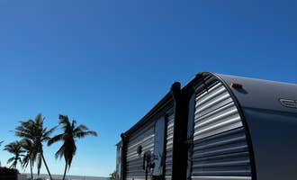 Camping near Lake San Marino RV Resort, A Sun RV Resort: Dancing Dolphins, Fort Myers Beach, Florida