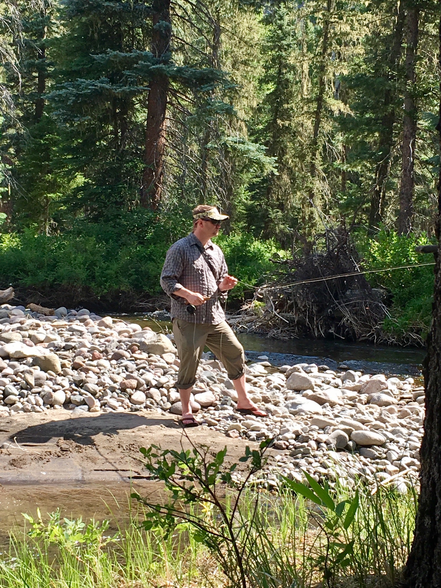 Fly fishing next to camp