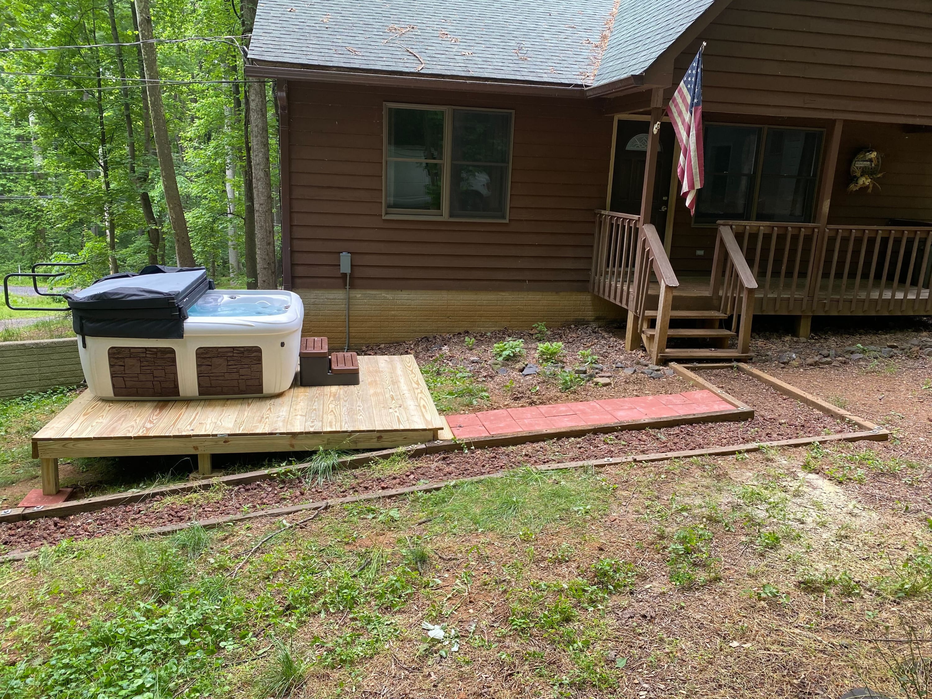 Camper submitted image from Hot Tub, Deck/Grill, Game Room, WiFi at Cute Cabin - 2