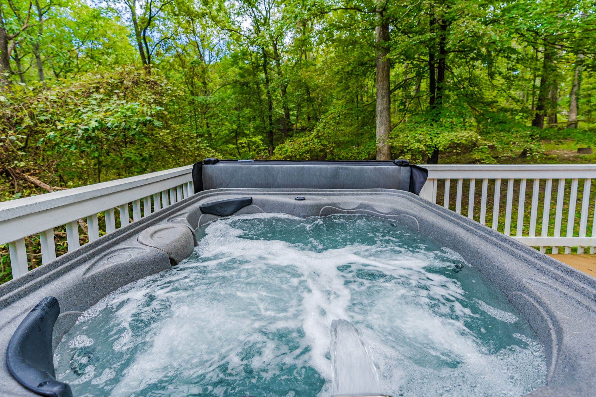 Camper submitted image from Hot Tub, Fire Pit, Deck, Grill, WiFi, Dog-Friendly - 1
