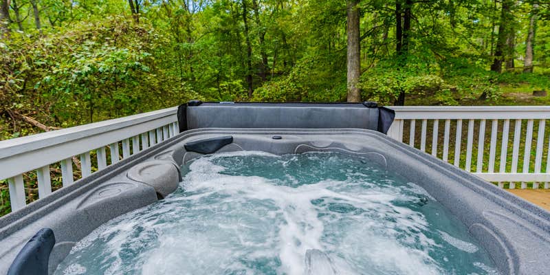 Camper submitted image from Hot Tub, Fire Pit, Deck, Grill, WiFi, Dog-Friendly