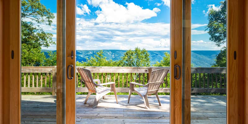 Camper submitted image from Amazing Views, Hot Tub, WiFi, Deck, & Fire Pit!