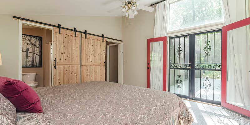 Camper submitted image from Secluded Oasis w Hot Tub, Screened-in Porch, WiFi!