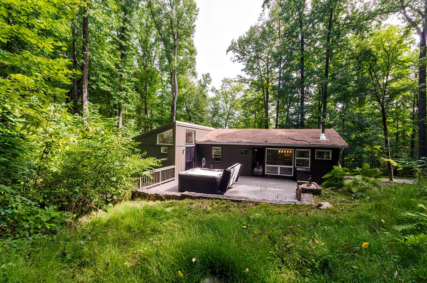 The Dyrt's photo of a cabin at Secluded Oasis w Hot Tub, Screened-in Porch, WiFi! near Flintstone, MD