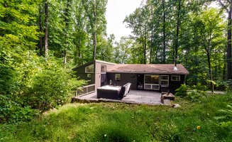 The Dyrt's photo of a cabin at Secluded Oasis w Hot Tub, Screened-in Porch, WiFi! near Clearville, PA