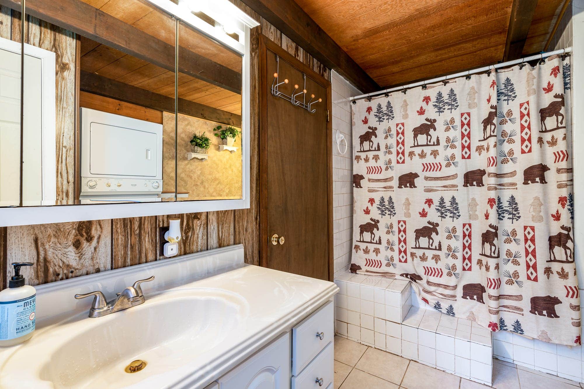 Camper submitted image from Log Cabin w Loft, Hot Tub, Deck, Fire Pit, & WiFi - 1