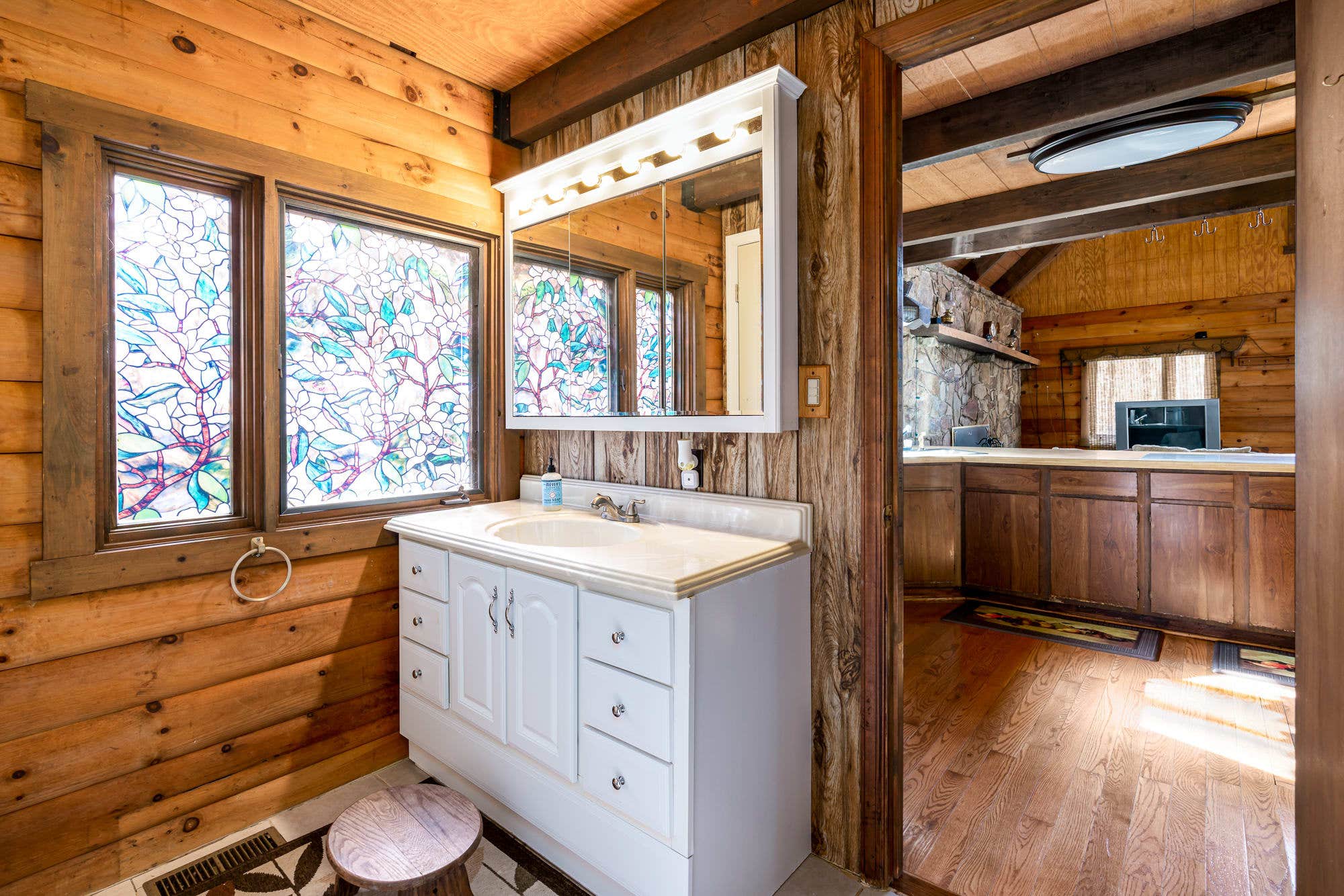 Camper submitted image from Log Cabin w Loft, Hot Tub, Deck, Fire Pit, & WiFi - 2