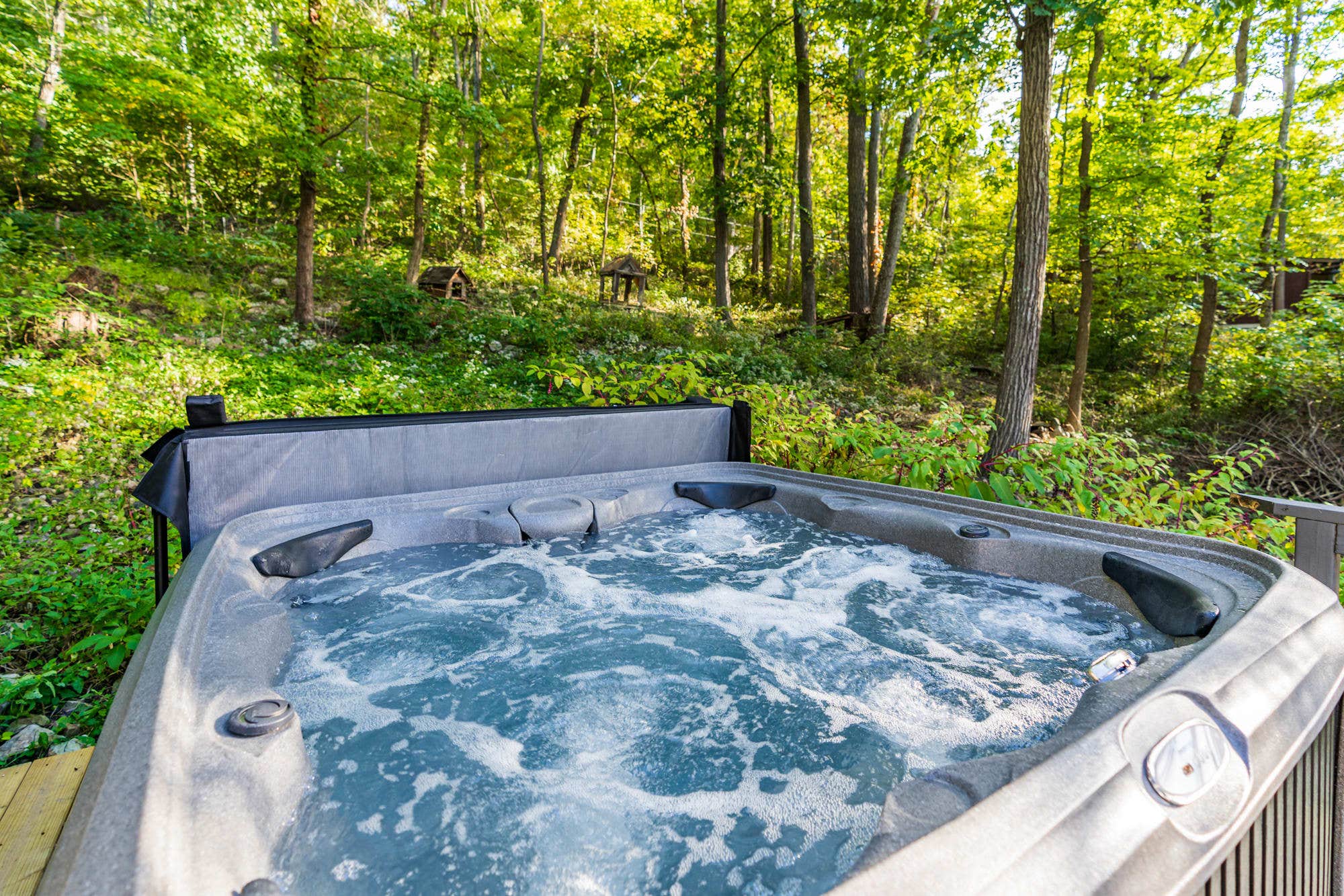 Camper submitted image from Hot Tub, Wraparound Deck, & WiFi at Chalet Cabin - 1