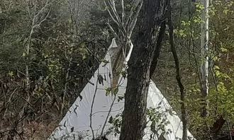 Camping near Fiery Fork Conservation Area: Tipi village , Stover, Missouri