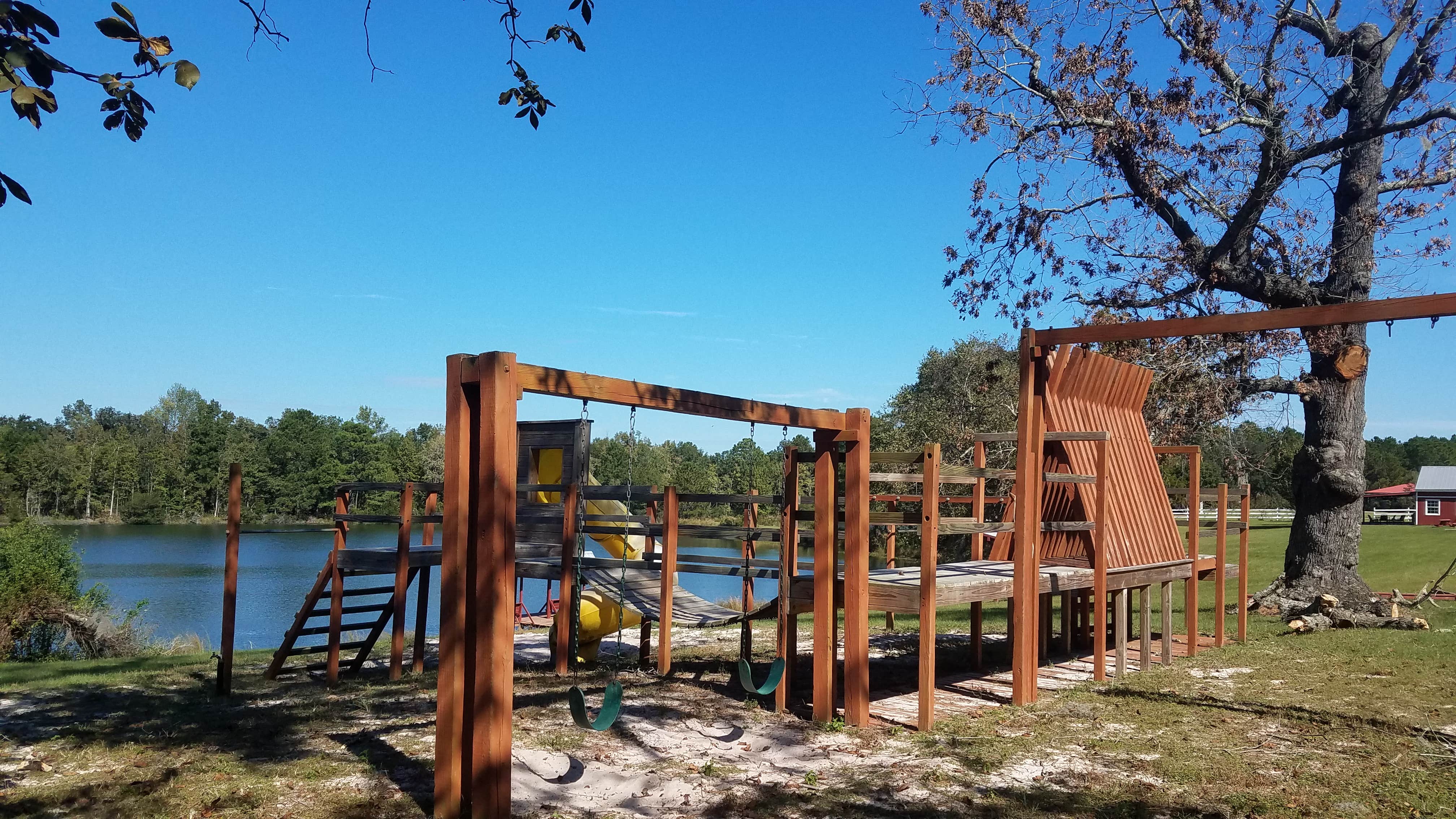Playground with pond behind it. Supposedly there are alligators out there and you shouldn't roam between the ponds.