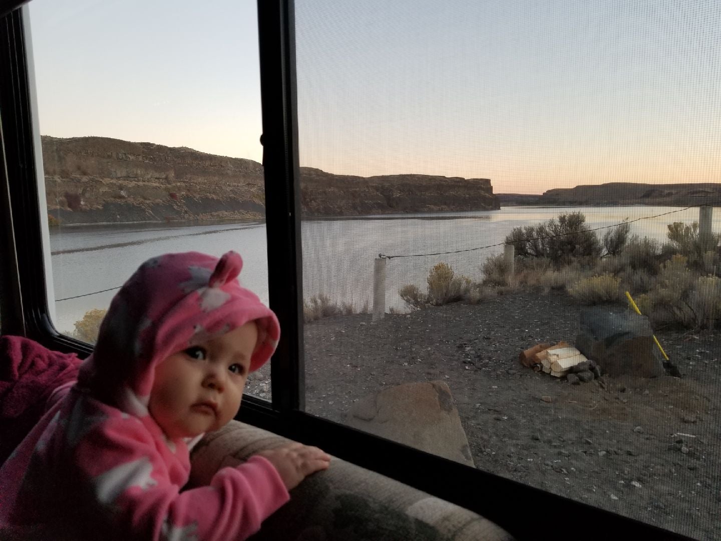 Daughter keeping an eye on the lake
