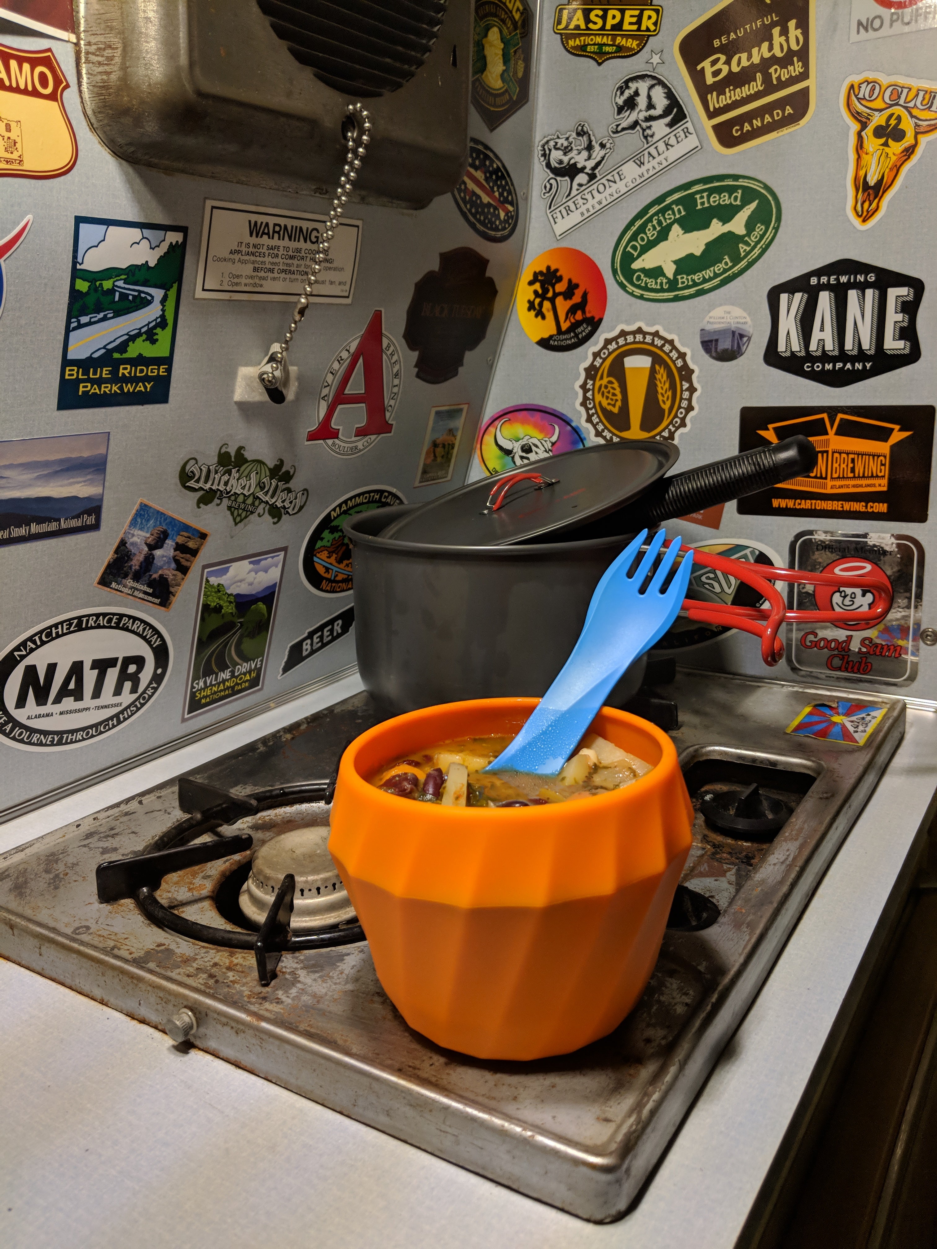 After heating up some soup in our campervan, we're ready to head out to the campfire for dinner (featuring our humangear FlexiBowl and GoBites utensil). 