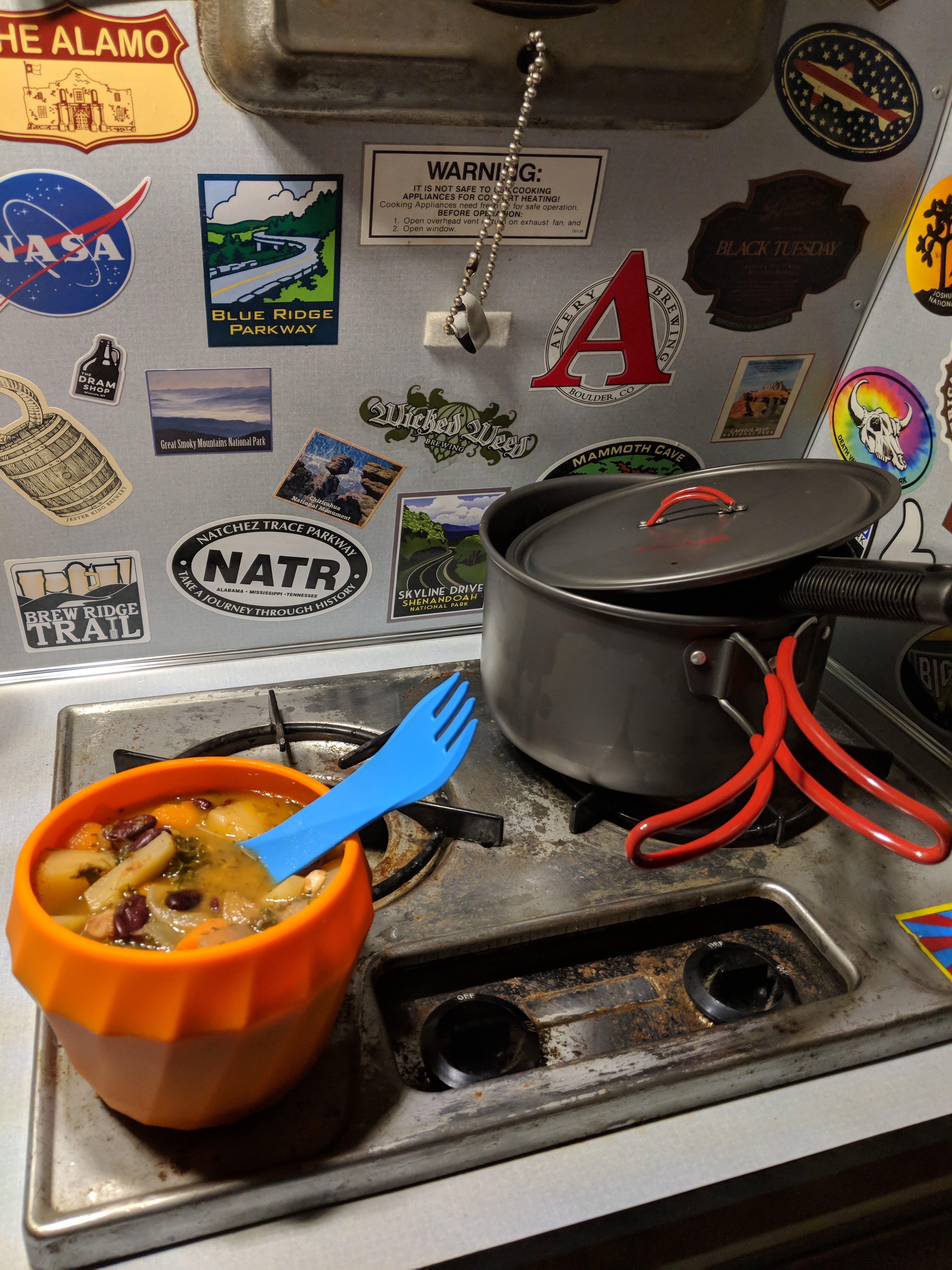 After heating up some soup in our campervan, we're ready to head out to the campfire for dinner (featuring our humangear FlexiBowl and GoBites utensil). 