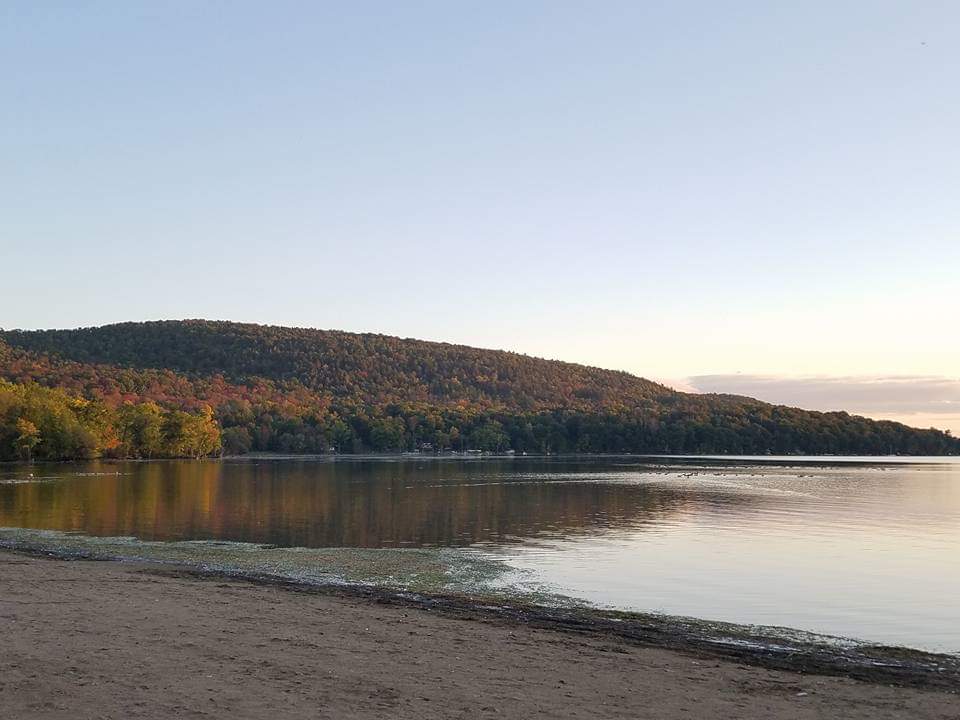 View of the northern tip of Otsego Lake from the camping area of Glimmerglass State Park. We camped in our teardrop trailer when we had this view. 