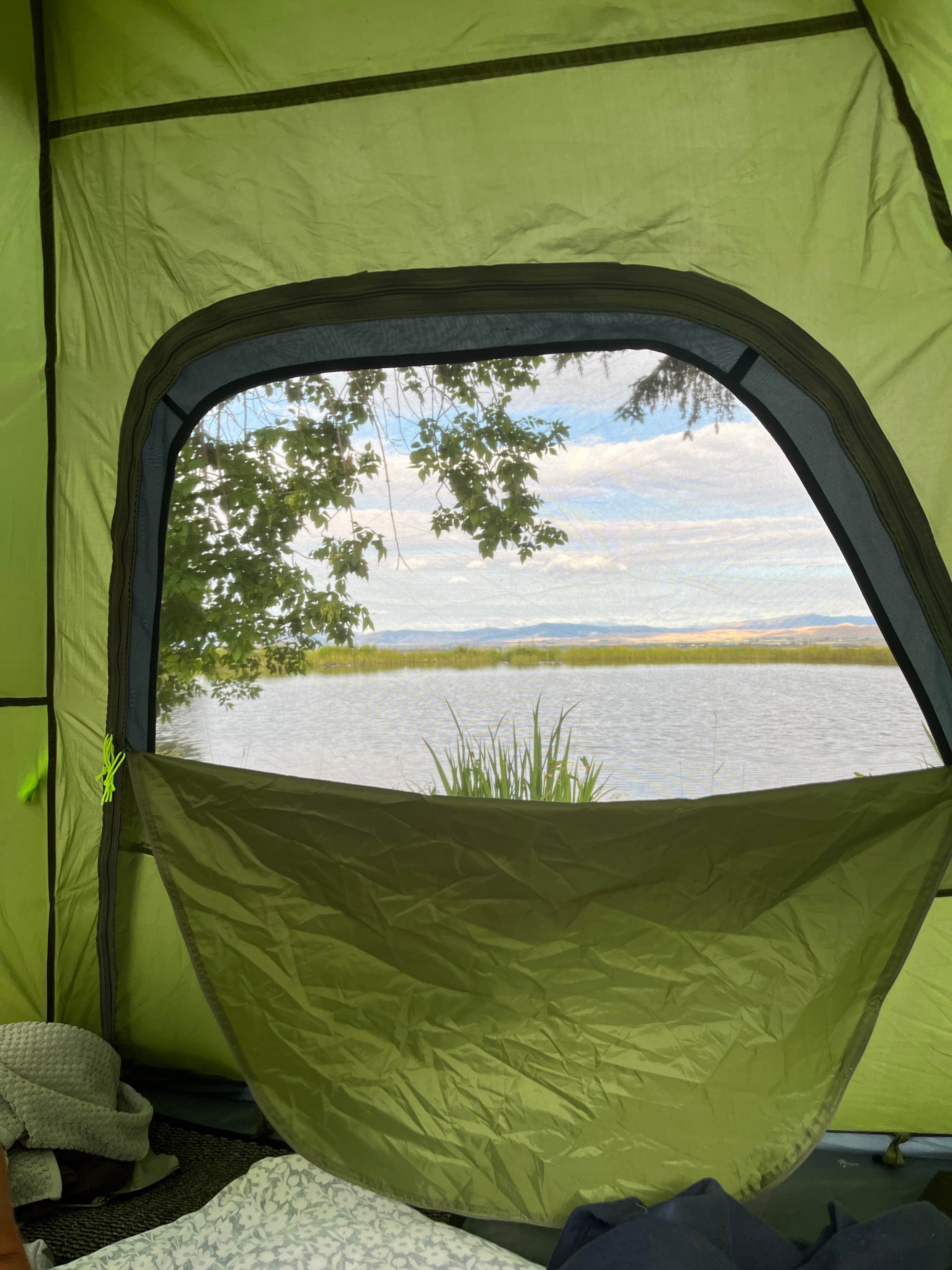 Melita B.'s photo of tent camping at Mere’s Magic Trout Pond near Flathead National Forest