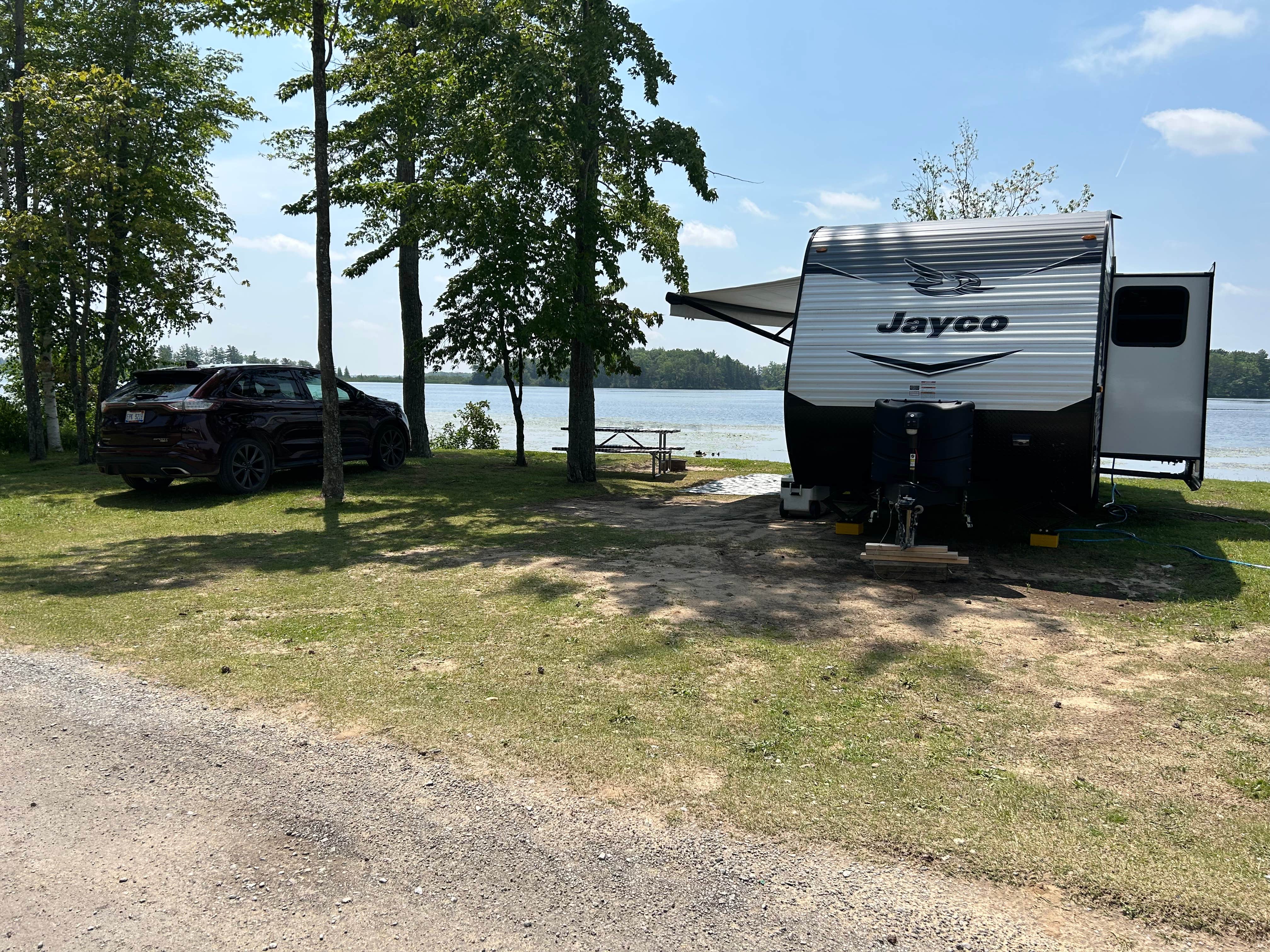 Camping near Long Lake County Park: Campers Cove RV Park And Canoe Livery, Alpena, Michigan