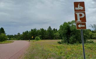 Laura M.'s photo of camping with pets at Adams Trail Dirt Lot near Grand Marais, MI
