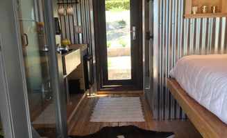 Ashley F.'s photo of camping with pets at Unique Wine Country Fat Barrel Experience near Coalinga, CA
