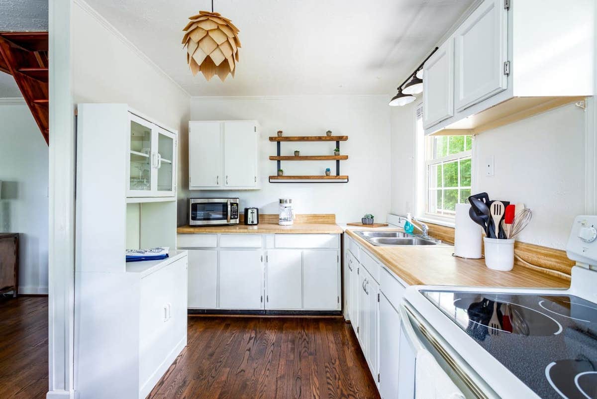 Camper submitted image from Cozy Cottage w Hot Tub, Fire Pit, WiFi & Sunroom! - 2