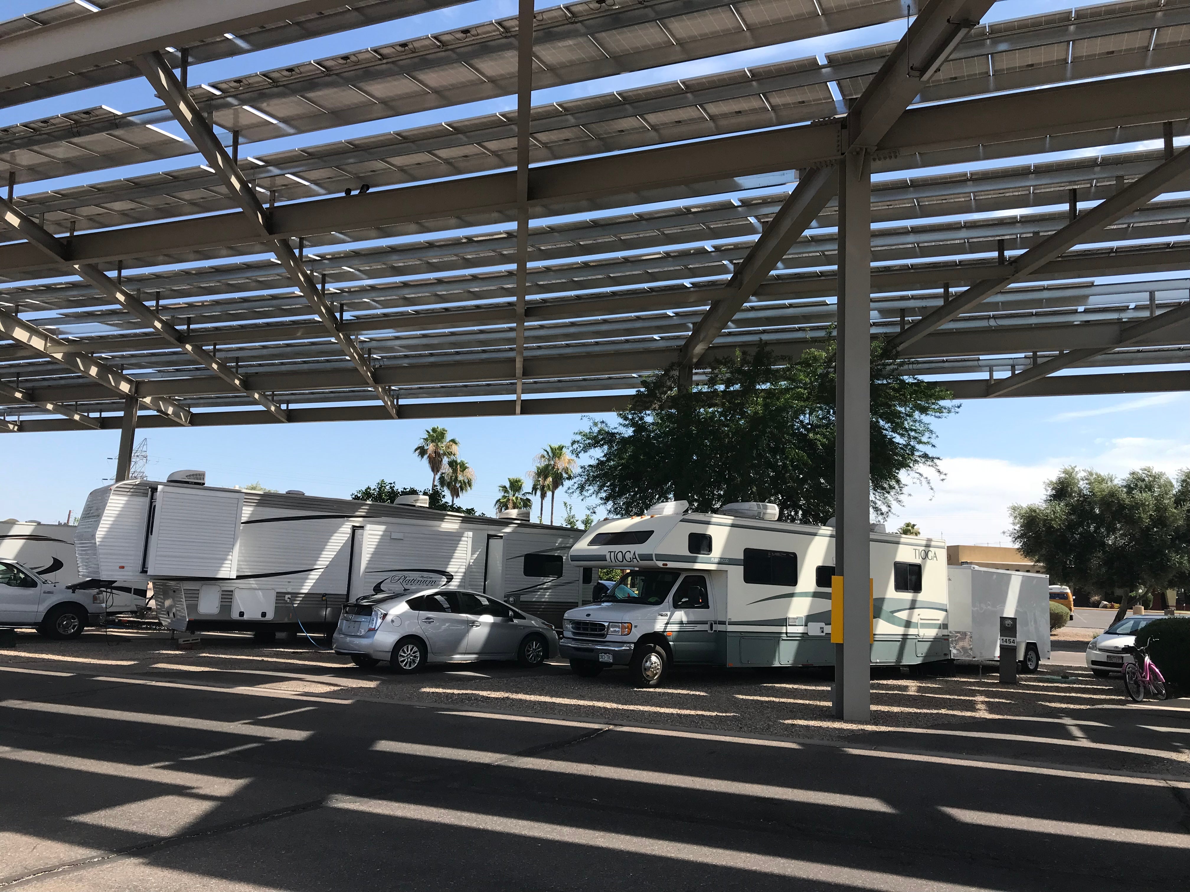 Gigantic solar shade array above RV sites. Green energy nicely shades your rigs