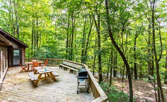 The Dyrt's photo of a cabin at Huge Cabin w Hot Tub, Deck, Grill, Fire Pit, WiFi near Berkeley Springs, WV