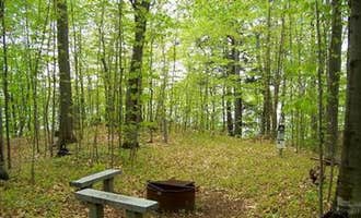 Camping near Chapel Beach Backcountry Campsites — Pictured Rocks National Lakeshore: Road's End Campsite on Grand Island, Munising, Michigan