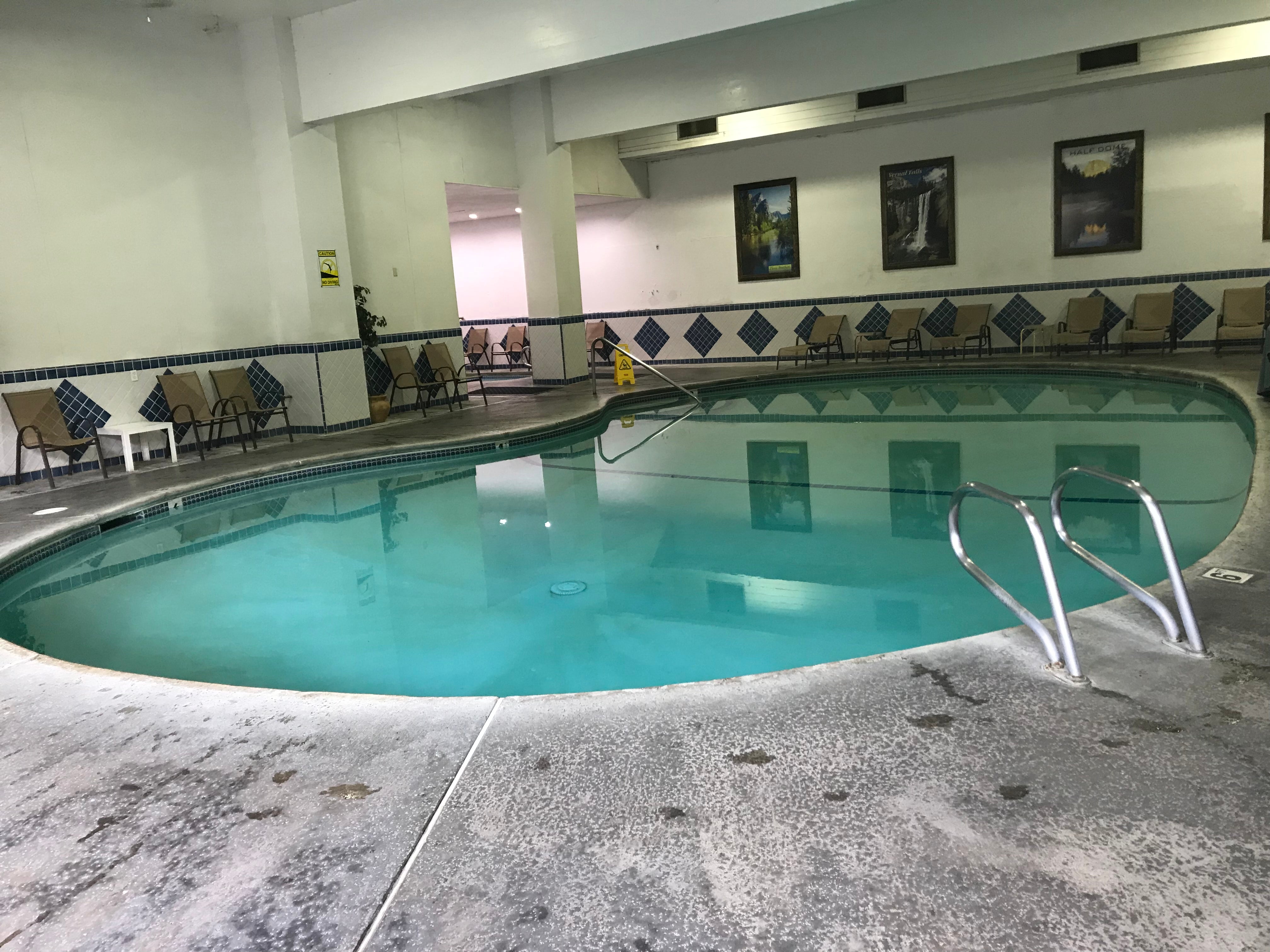 The indoor pool and hot tub (at the hotel next door) that campers can use.