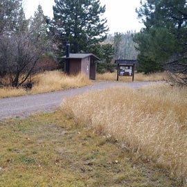 Water location (faucet removed for the winter) and Vault Toilet at the Group Use Campground