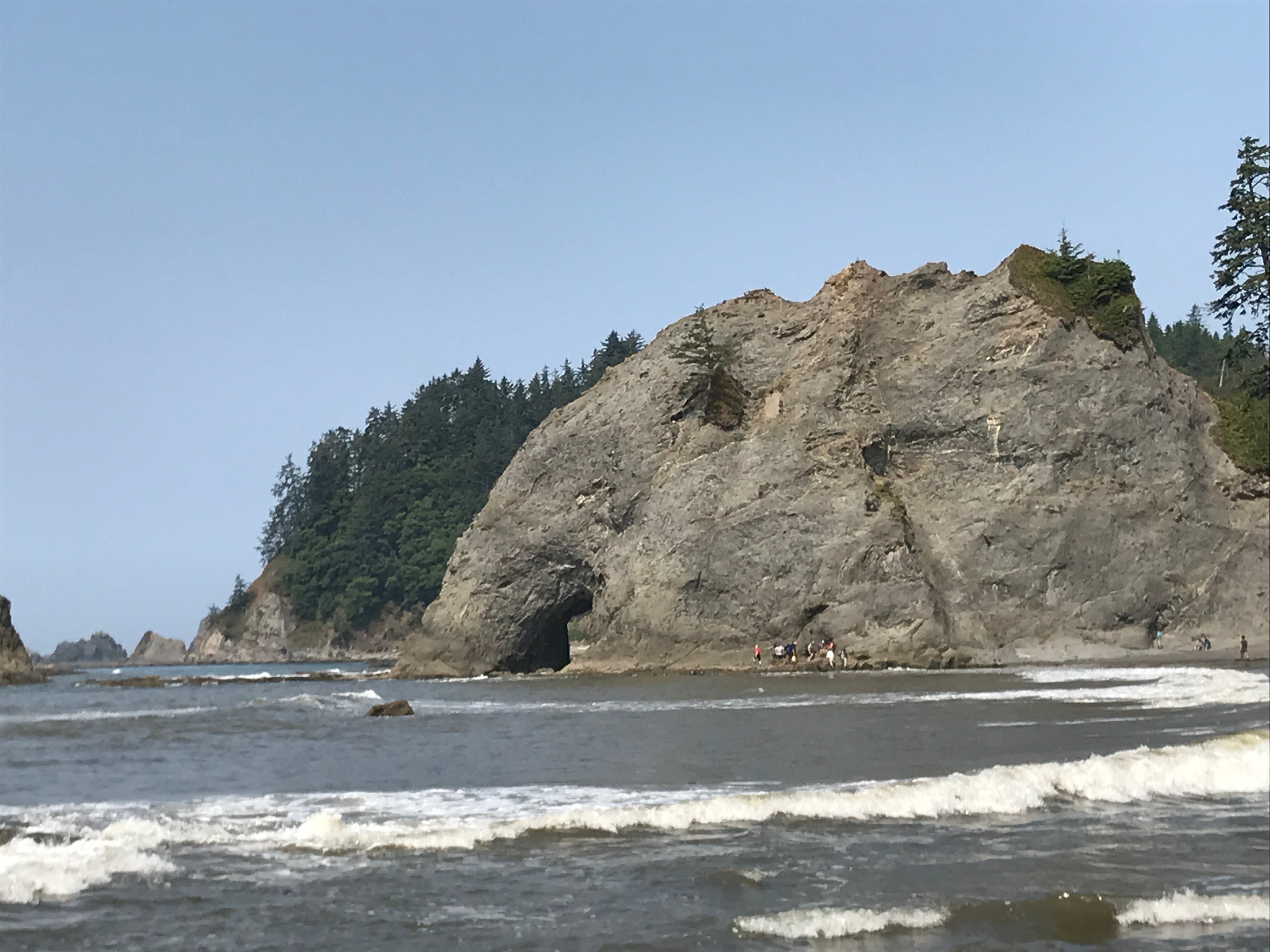 A view of hole in the wall from down the beach.