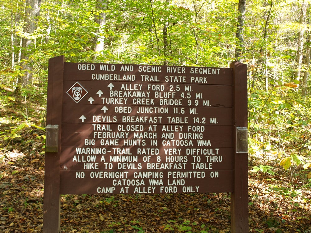 Trail sign for the Cumberland Trail section that runs through the Obed Wild and Scenic River National Park. Trailhead at Rock Creek Campground.