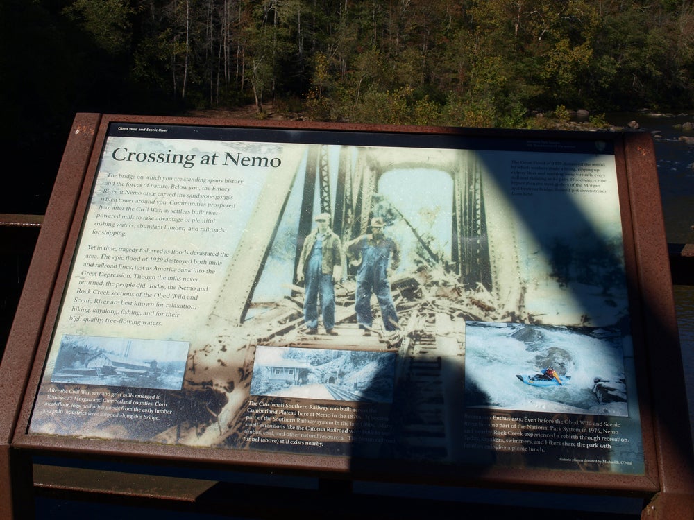 Historic information plaque on Nemo Bridge.