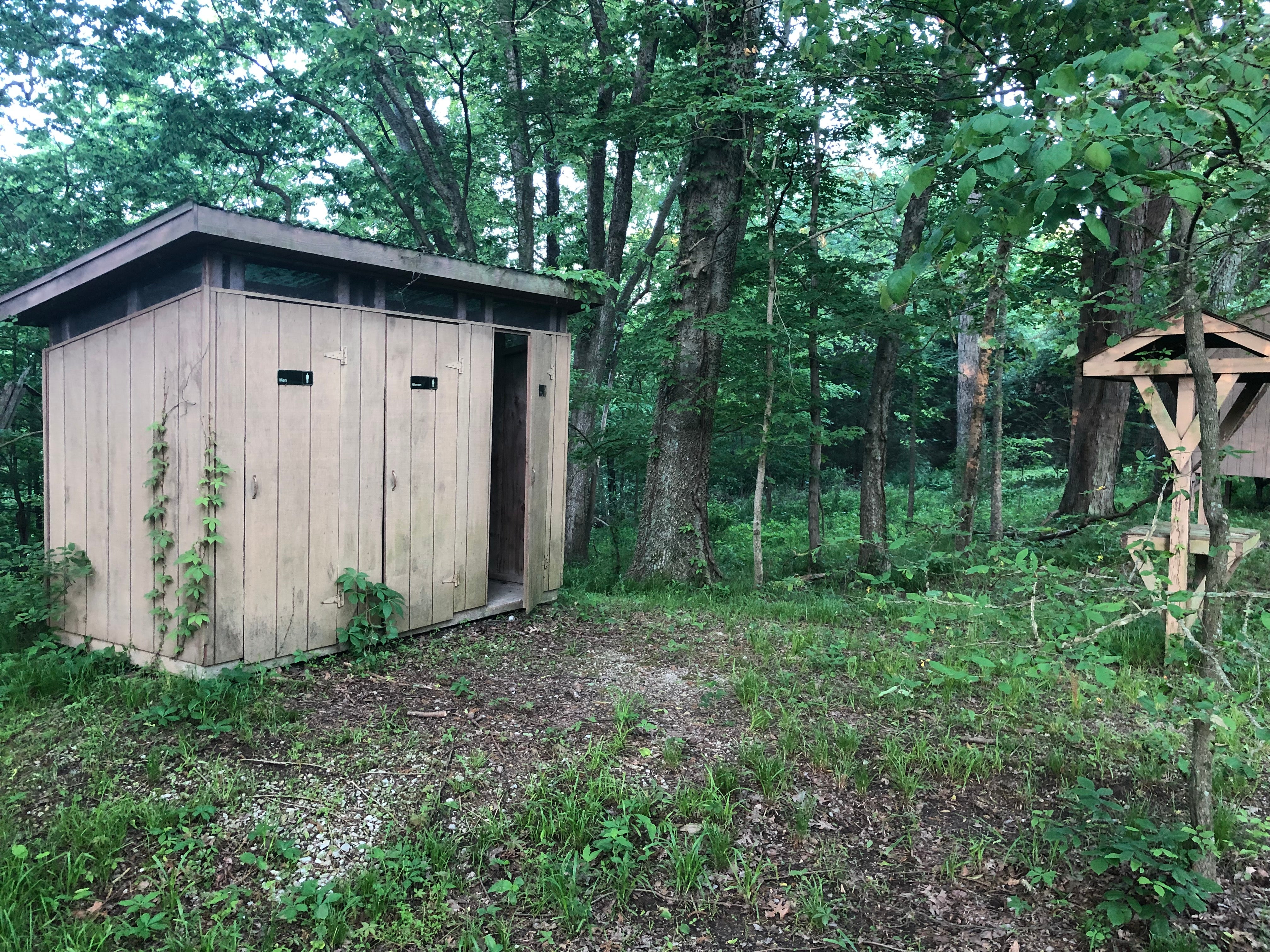 Two flushing toilets are available but there are outhouses placed around as well