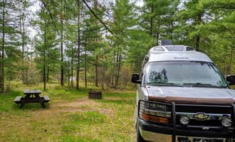 Camping near Trails Campground: Jones Lake State Forest Campground, Frederic, Michigan