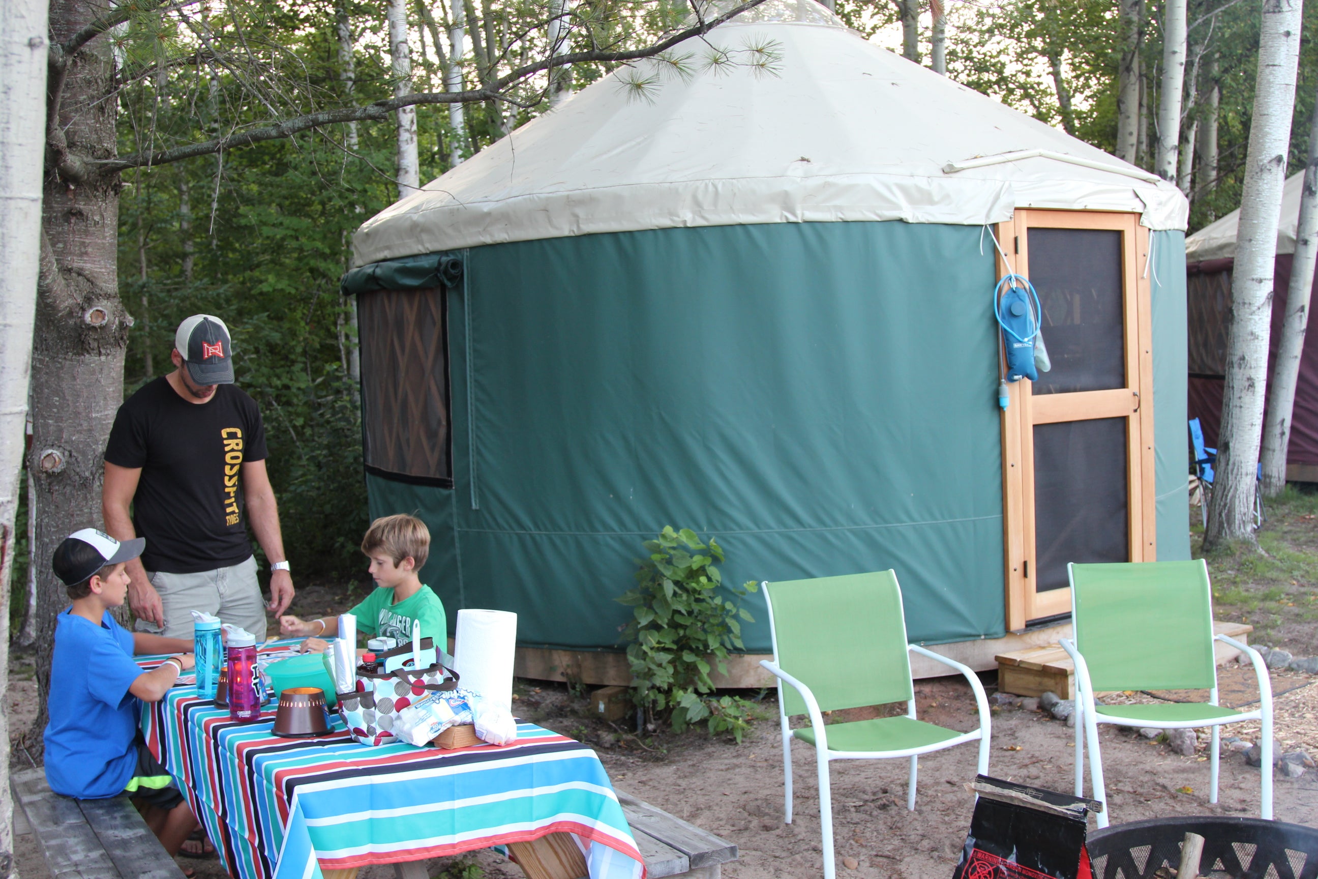 Our Yurt, with fire pit, picnic table, and grill.