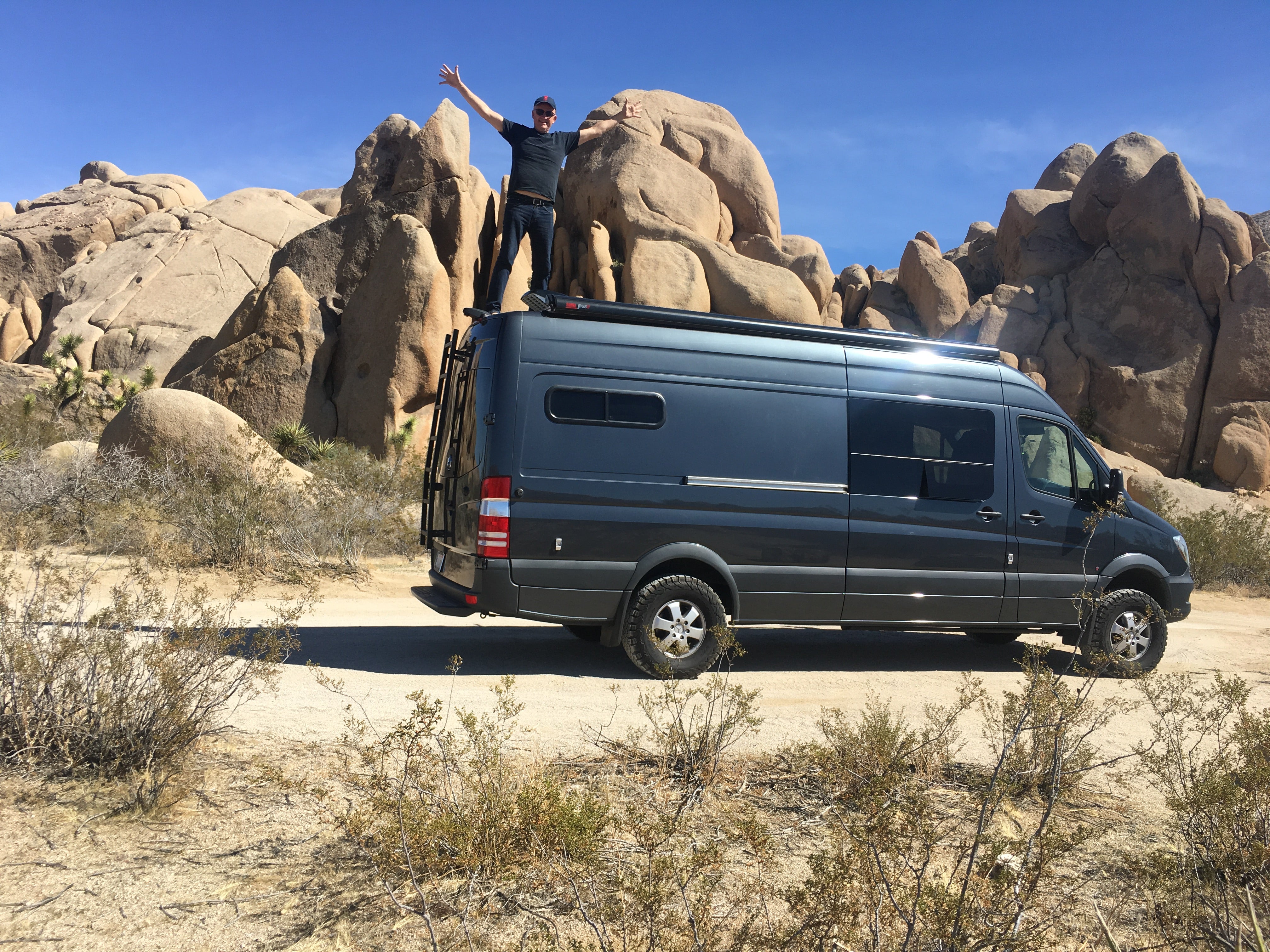 Van near rock formation