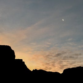 View of the sun rising over the Chisos Mountains