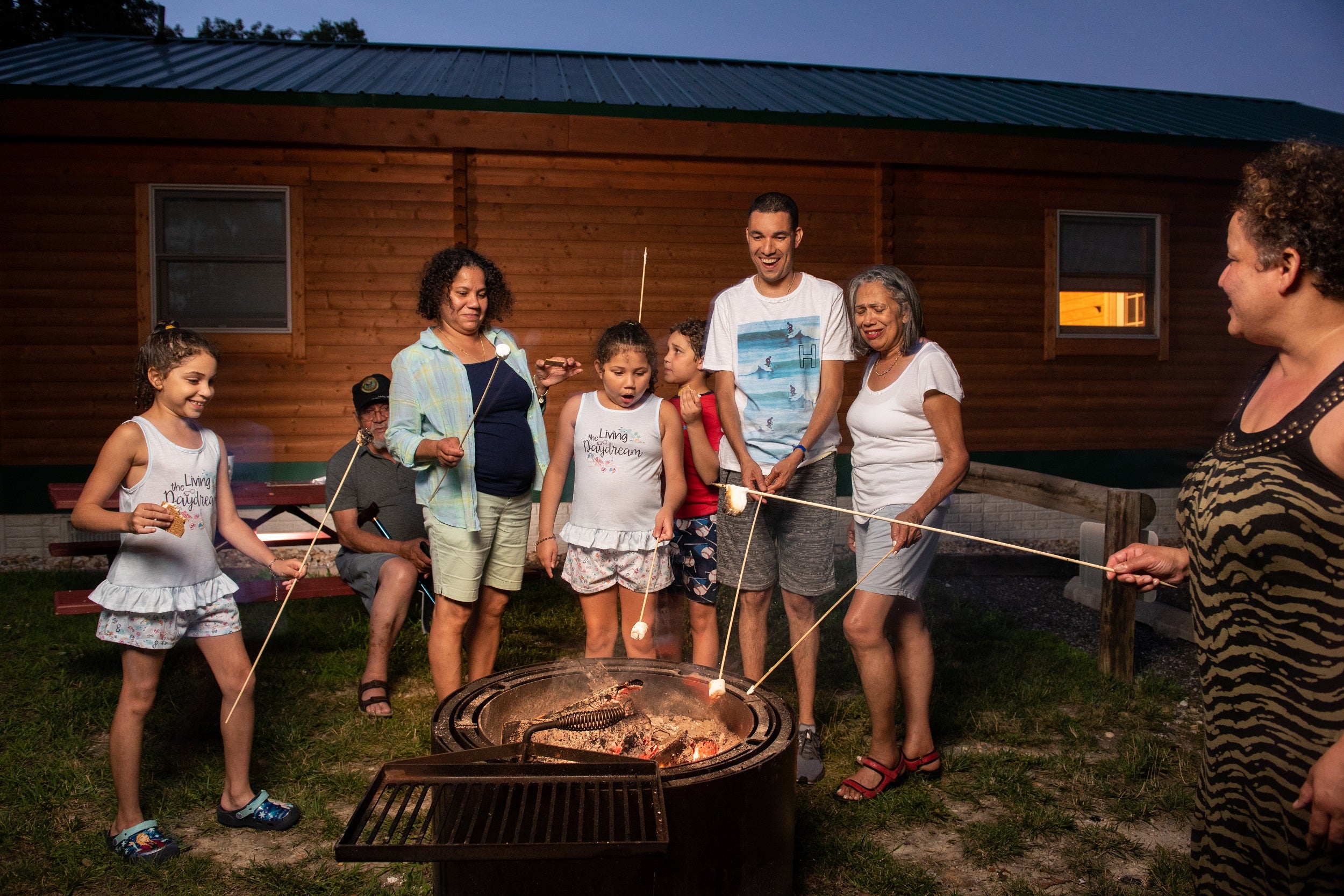 Cabins come with fire pits and outdoor picnic areas.