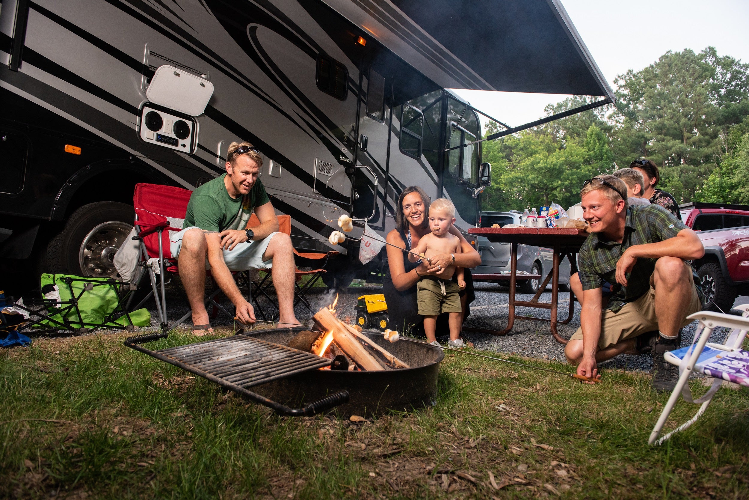 A family enjoying one of our standard, back-in RV sites.