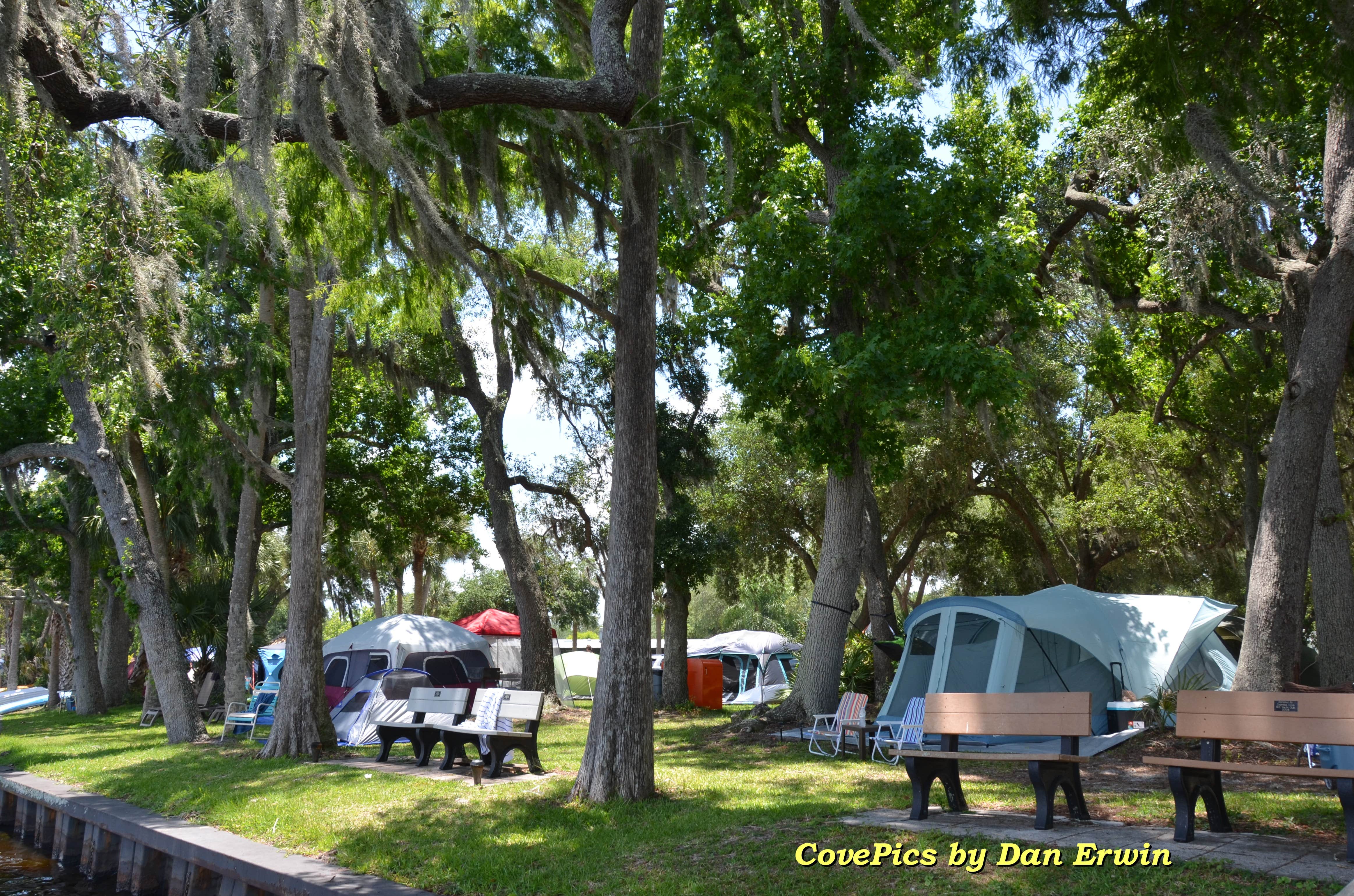 Imagine waking up, zipping down the tent flap, and feeling the warm lake breeze under the shady oaks and cypress trees!